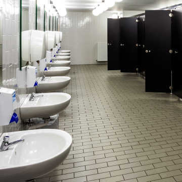 Bathroom hardware inlcuding partitions, soap dispensers, sinks, and paper towel dispensers