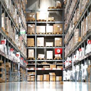 Commercial warehouse shelving filled with boxes of supplies