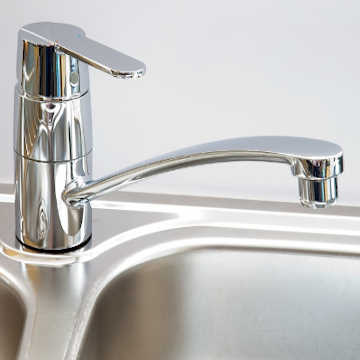 Stainless steel kitchen sink and faucet